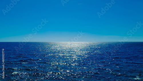 Blue sea and blue sky. Calm sea on a sunny day. photo