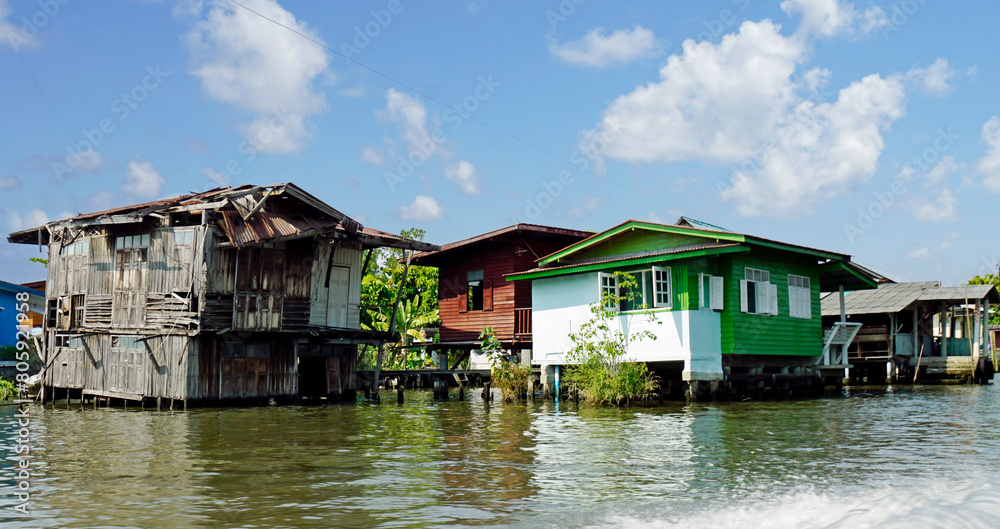 Wooden houses on the chao praya river in bangkok