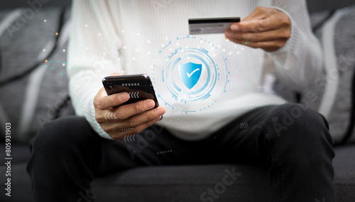 security mobile banking application, internet banking and online payment concept and man using smartphone and online payment by credit card at home