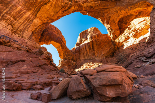 The Double Arch rock formation in the Arches National park near Moab, Utah USA. photo