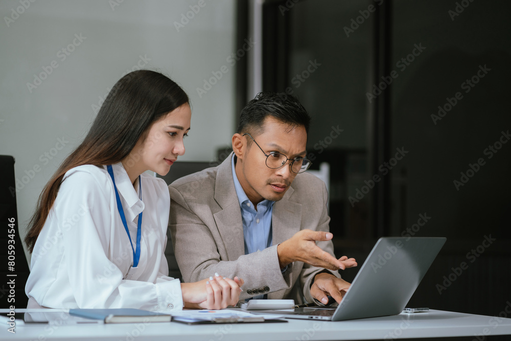 Asian business people working as a good team in the office. Successful teamwork in a meeting, workplace concept. Asian business people working as a good team in the office. Successful teamwork in a meeting, workplace concept.