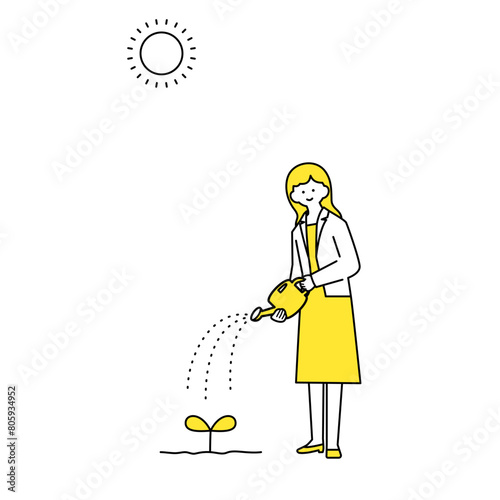  じょうろで水やりをする女性