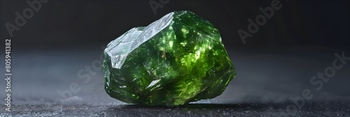 Awe-inspiring display of raw Tsavorite gemstone exuding brilliant green hues photo