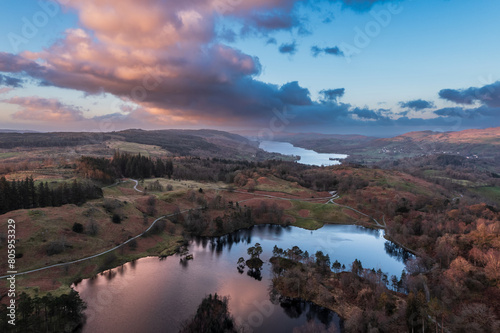 Beautiful  aerial drone landscape image of Lake District during Spring vibrant sunset