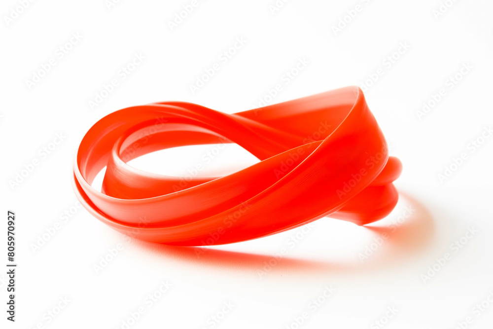 A bright red rubber band, stretched and twisted into an interesting shape, resting on a stark white background. A bright red rubber band, stretched and twisted into an interesting shape, resting on a stark white background.