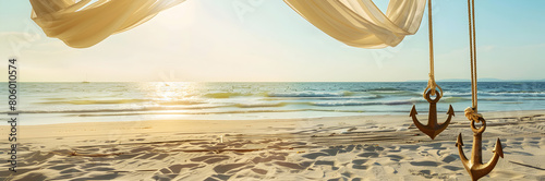 Beach canopy anchors web banner. Beach canopy anchors isolated on sandy background with copy space. photo