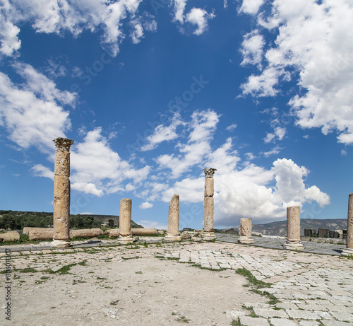 Roman ruins at Umm Qais (Umm Qays)--is a town in northern Jordan near the site of the ancient town of Gadara, Jordan. Against the background of a beautiful sky with clouds © Владимир Журавлёв