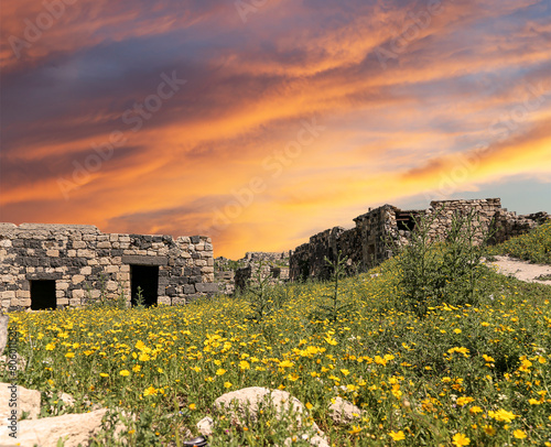 Roman ruins at Umm Qais (Umm Qays)--is a town in northern Jordan near the site of the ancient town of Gadara, Jordan. Against the background of a beautiful sky with clouds