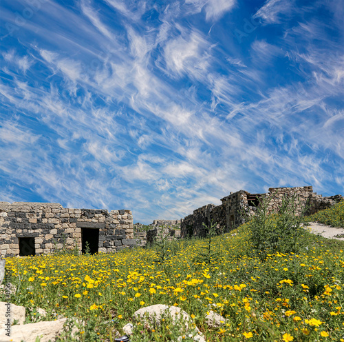 Roman ruins at Umm Qais (Umm Qays)--is a town in northern Jordan near the site of the ancient town of Gadara, Jordan. Against the background of a beautiful sky with clouds