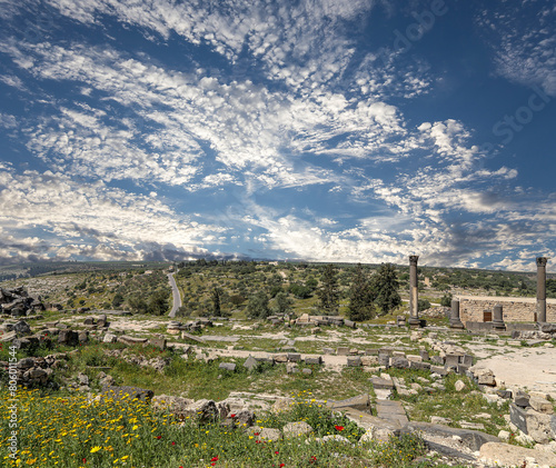 Roman ruins at Umm Qais (Umm Qays)--is a town in northern Jordan near the site of the ancient town of Gadara, Jordan. Against the background of a beautiful sky with clouds