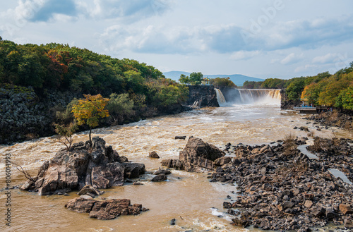 Waterfall at Jingbo Lake Scenic Area in Mudanjiang, Heilongjiang, China in autumn photo