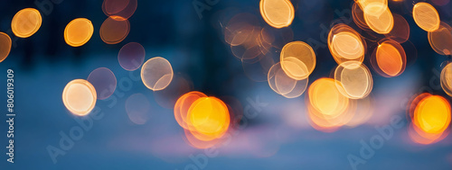 Yuletide Radiance, Abstract Background of Christmas Lights Amidst a Snowy Landscape, Enhanced by Bokeh Lights and a Soft Blur of Winter Wonders.