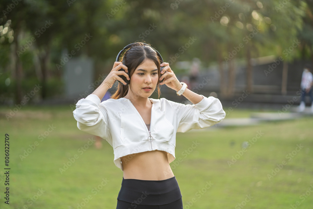 Portrait of sport slim fit strength asian woman training in sportswear sitting relax and practicing yoga, fitness, exercise, wellness, workout, sport at home.Diet concept.Fitness and healthy lifestyle Portrait of sport slim fit strength asian woman training in sportswear sitting relax and practicing yoga, fitness, exercise, wellness, workout, sport at home.Diet concept.Fitness and healthy lifestyle
