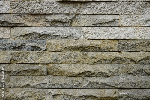 Neatly arranged natural stone wall background