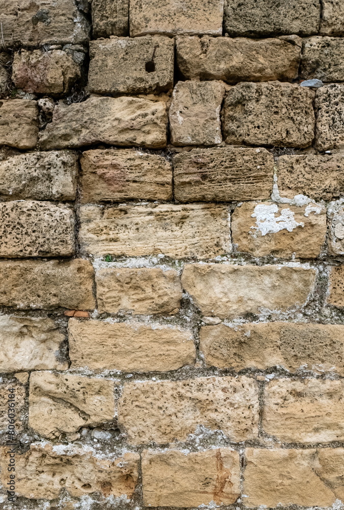 Fototapeta premium Ancient Stone Wall Close-Up Earthy Tones