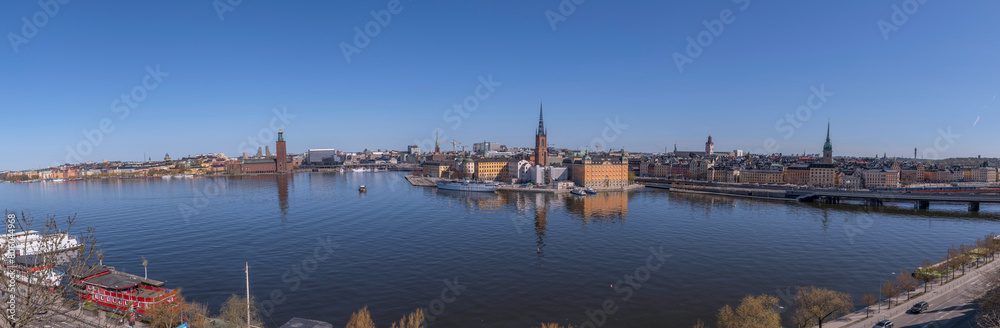Panorama view from the vista point board walk Monteliusvägen, the down town, Town City Hall, the old town Gamla Stan, a sunny spring day in Stockholm