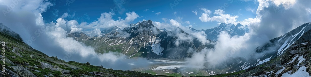 Heavenly Mountain Landscape in Summer: Breathtaking Nature Panorama with Clouds and Snow-Capped