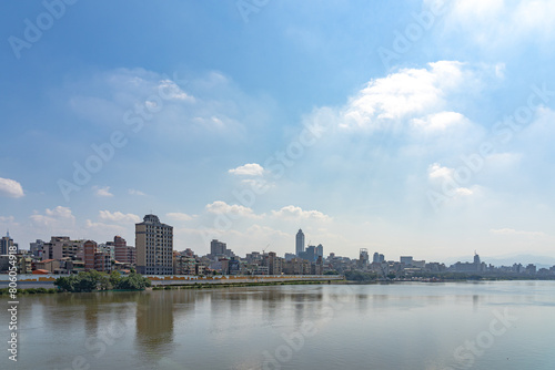 Scenery of Tamsui river bank, view on Taipei bridge, a bridge link New Taipei City to Taipei city, Taiwan © Shawn.ccf