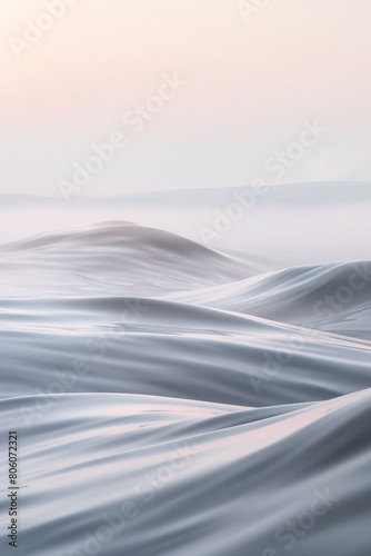 A tranquil depiction of soft grey and pastel pink waves flowing together, suggesting the delicate touch of mist over a calm water surface at dawn.