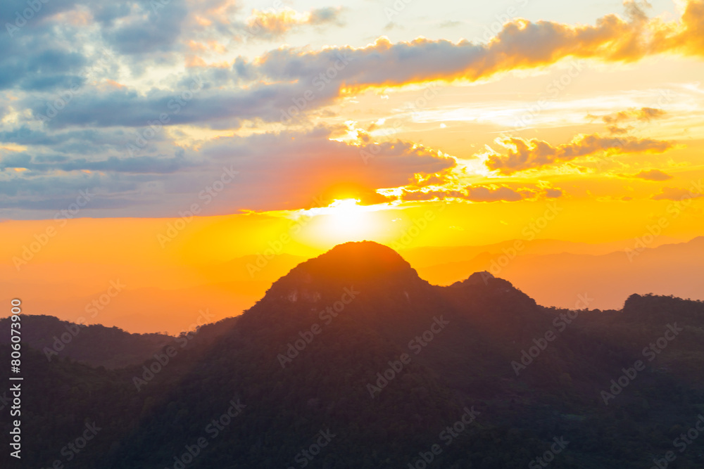 Sunset on the top of mountain tropical forest colourful sky cloud Sunset on the top of mountain tropical forest colourful sky cloud