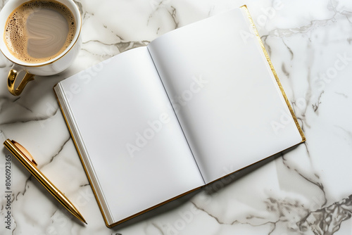 Elegant shot of white empty open book or planner mockup on a marble desk with cup of dark strong coffee and gold pen laying near, ready for time management, morning routine, starti photo