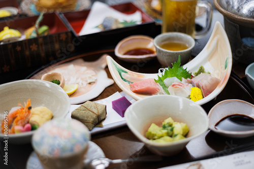 Japanese banquet in a ryokan, Japanese hostel, including sashimi, 