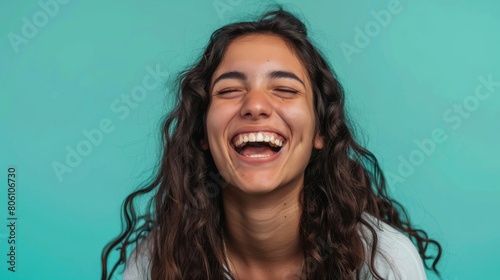Young Uruguayan woman over isolated background laughing hyper realistic  photo