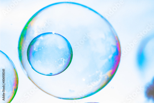 Wallpaper Mural soap bubbles against the sky, reflection of the sun in the bubbles, color play, abstraction Torontodigital.ca