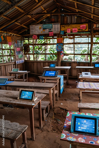 A classroom in a rural area receiving digital educational tools, illustrating the impact of global partnerships on education improvements