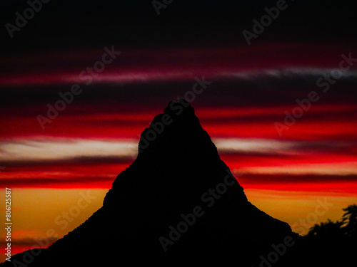 Peak in Mauritius in dramatic red sunset