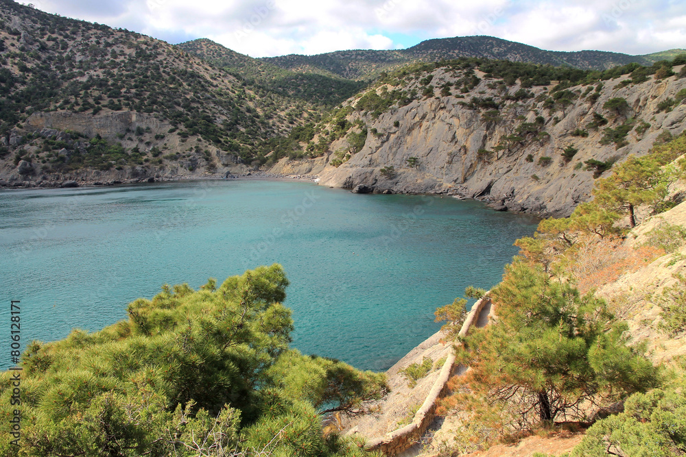 Crimea. New World. View of the Tsarsky Beach and the picturesque blue bay. Crimea. New World. View of the Tsarsky Beach and the picturesque blue bay.