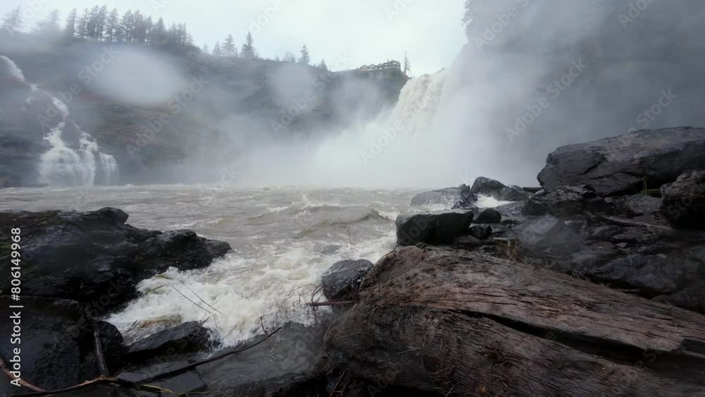 Standing Below Intense Waterfall Splashing the Camera Standing Below Intense Waterfall Splashing the Camera