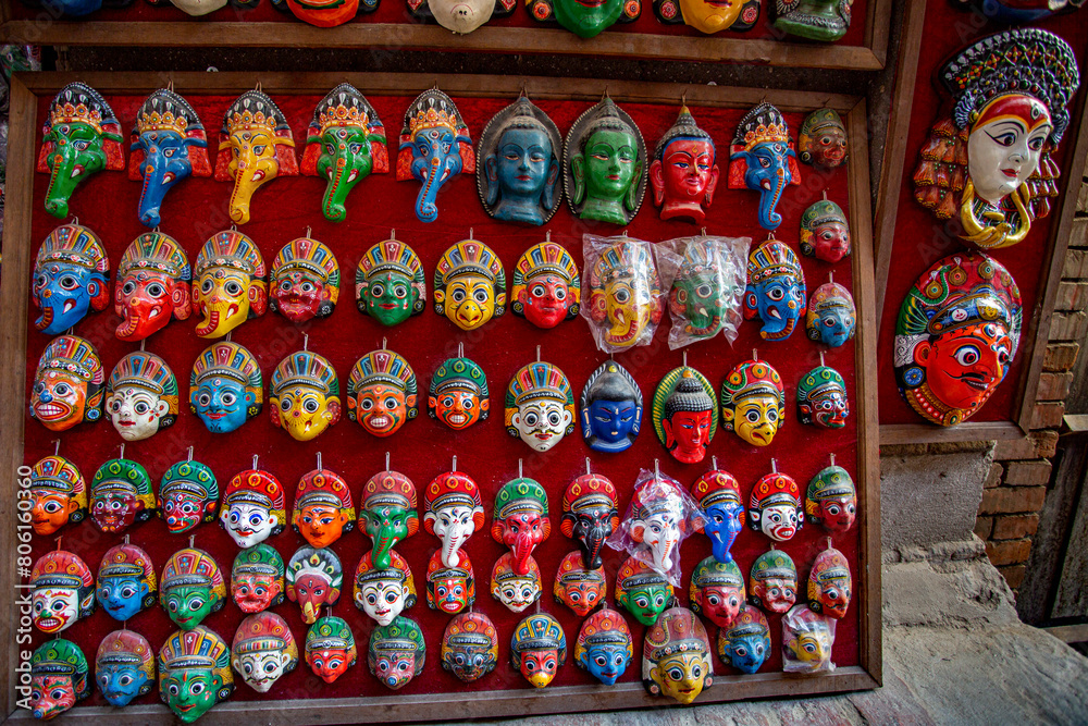 Traditional handcrafted masks and souvenirs for sale in street shop of Kathmandu, Nepal