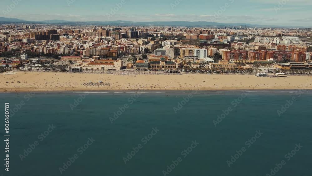 Drone flight over the Valencia sea. Valencia beach by drone. Valencia city taken by drone. Sunny day Beach by drone. People rest at the beach in a sunny day. Drone flight over the Valencia sea. Valencia beach by drone. Valencia city taken by drone. Sunny day Beach by drone. People rest at the beach in a sunny day.