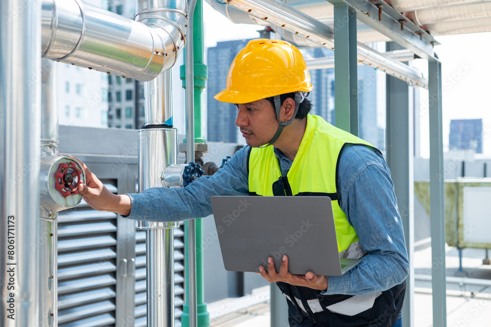 Engineer under industrial inspection Large water heaters are used in high-rise condominiums Engineer under industrial inspection Large water heaters are used in high-rise condominiums