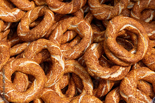 Bagels background. Close-up of traditional Turkish bagels known as simit. Simit or gevrek, traditional Turkish pastry food © welcomeinside