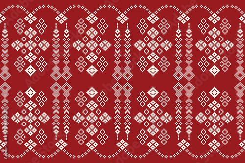Traditional ethnic motifs ikat geometric fabric pattern cross stitch.Ikat embroidery Ethnic oriental Pixel red background. Abstract,vector,illustration. Texture,christmas,decoration,wallpaper.