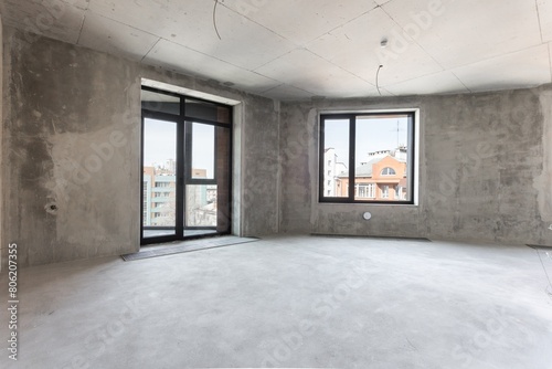 Wallpaper Mural interior of the apartment without decoration in gray colors. rough finish Torontodigital.ca