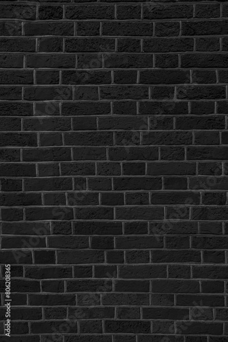 Old black brick wall. Abstract construction background.