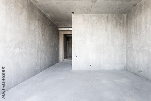 interior of the apartment without decoration in gray colors. rough finish