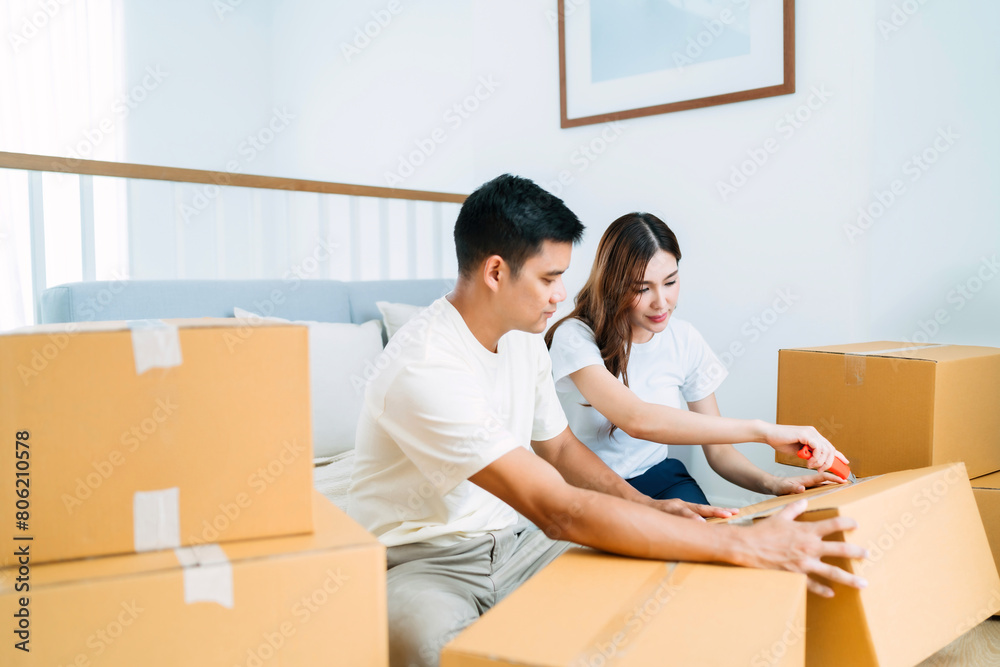 tired lover unpack box upper floor sitting at sofa. couple worn out preparing for new location open cardboard box and stuff. exhausted lover fatigued from lifting too many box unpack changing place tired lover unpack box upper floor sitting at sofa. couple worn out preparing for new location open cardboard box and stuff. exhausted lover fatigued from lifting too many box unpack changing place
