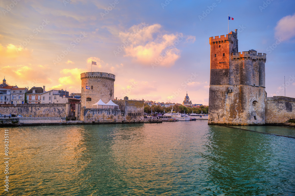 The Port Towers of La Rochelle in sunset light, France
