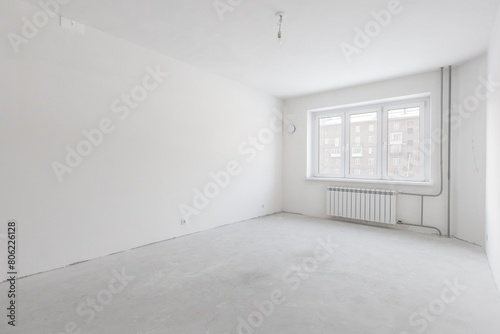 interior of the apartment without decoration in gray colors. rough finish