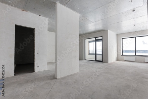 interior of the apartment without decoration in gray colors. rough finish