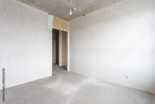 interior of the apartment without decoration in gray colors. rough finish