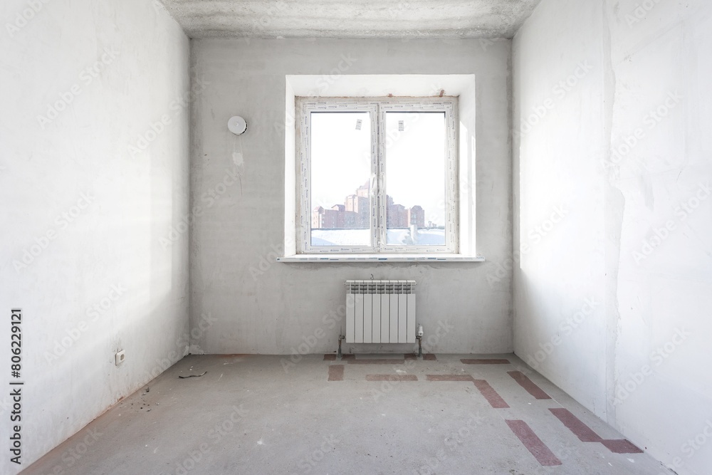 interior of the apartment without decoration in gray colors. rough finish interior of the apartment without decoration in gray colors. rough finish