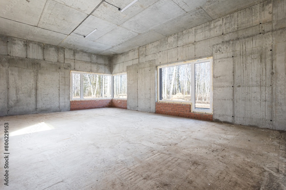 interior of the apartment without decoration in gray colors. rough finish interior of the apartment without decoration in gray colors. rough finish