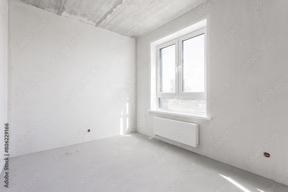 interior of the apartment without decoration in gray colors. rough finish interior of the apartment without decoration in gray colors. rough finish