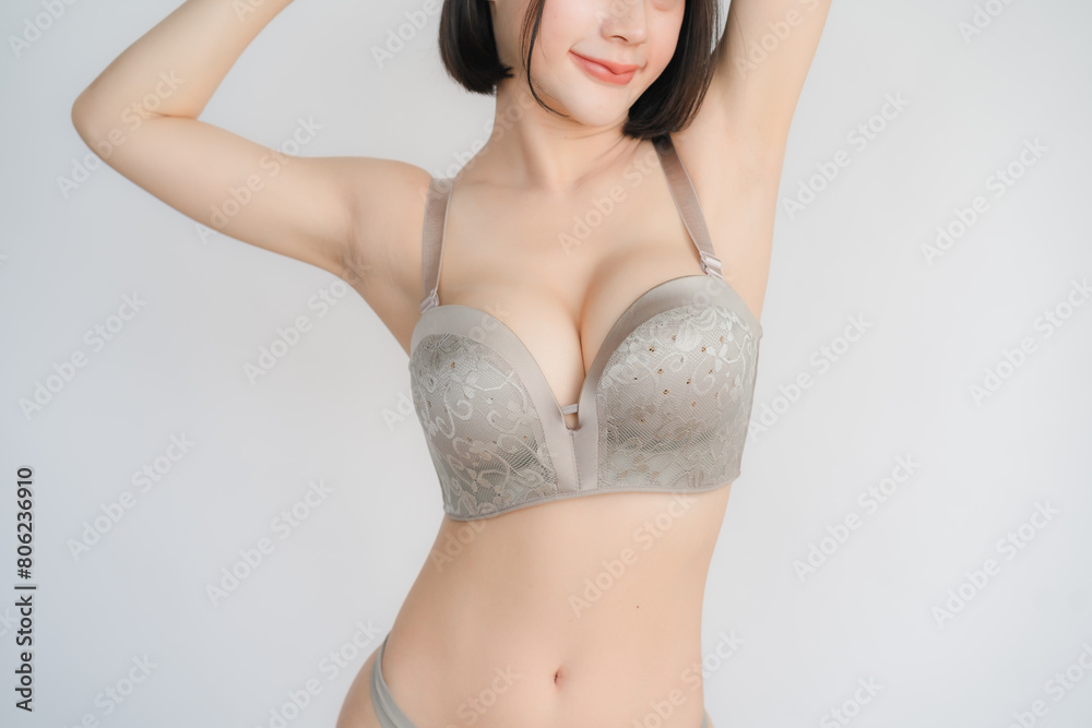 Fototapeta premium Beautiful slim body of woman in studio