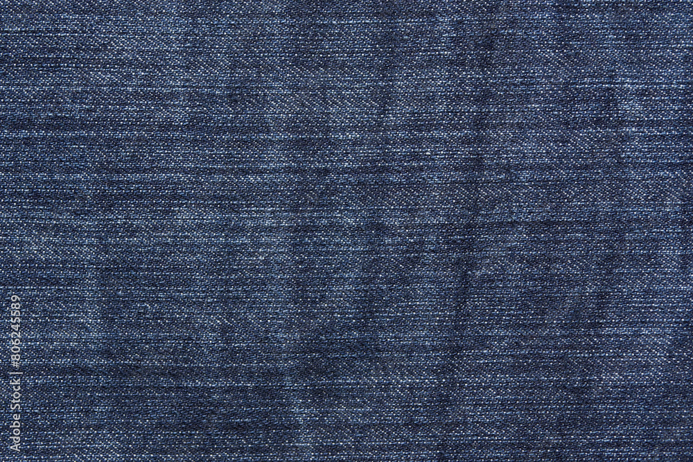 Blue jean texture. Blank denim cloth textile background. Soft fabric. Flat cotton surface. Grunge structure design. Dark navy material. Indigo vintage style. Copyspace Blue jean texture. Blank denim cloth textile background. Soft fabric. Flat cotton surface. Grunge structure design. Dark navy material. Indigo vintage style. Copyspace